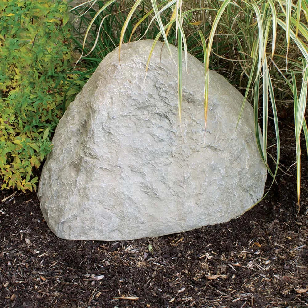 Airmax Truerock large sandstone boulder rock for decorative features, measuring 33x24x20 inches, natural textured surface.