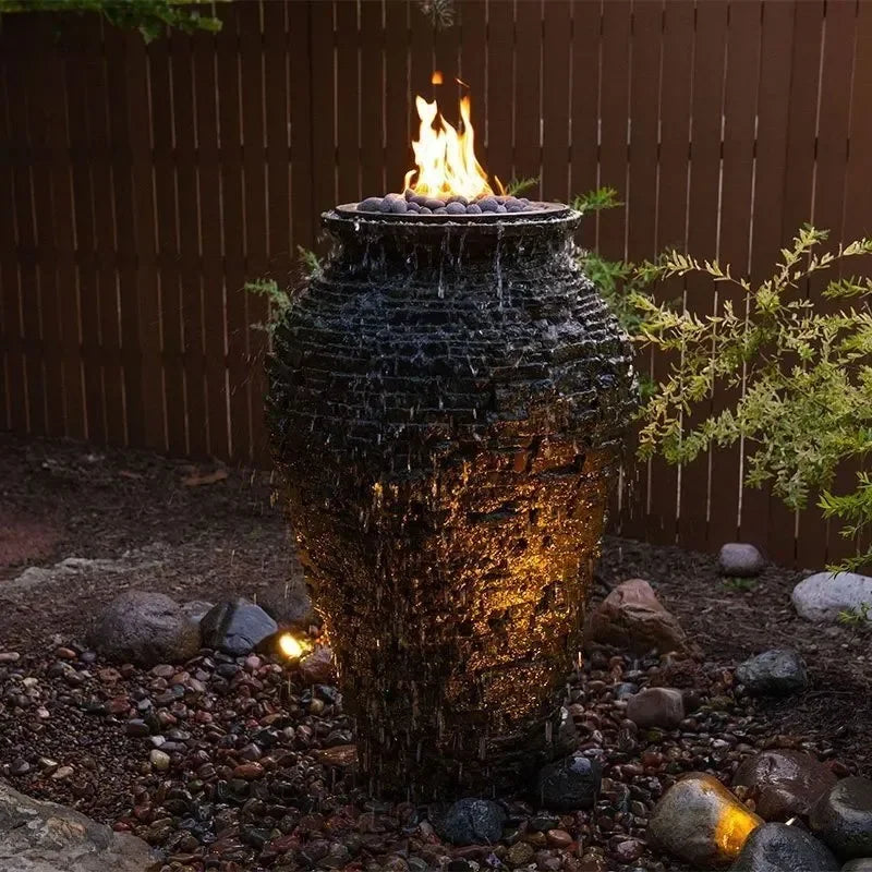 Large Aquascape fire and water stacked slate urn, a decorative feature with a natural stone finish and built-in fire and water elements.
