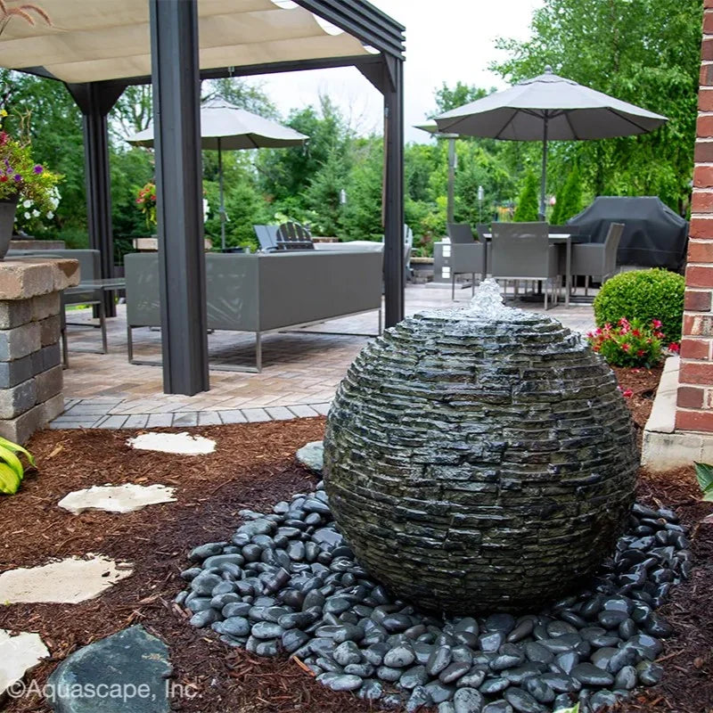 Aquascape stacked slate sphere decorative feature, 72-inch diameter, natural slate ball for garden or pond decor.