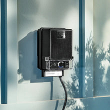 Kichler Economy landscape transformer in black, designed for outdoor lighting, with a compact, weather-resistant build.