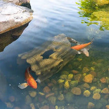 Aquascape Faux Log Fish Cave for aquariums, natural-looking decorative feature with hollow interior for fish hiding and exploring.